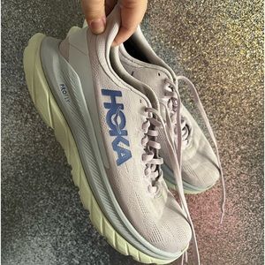 Purple size 8 Hoka running shoes.